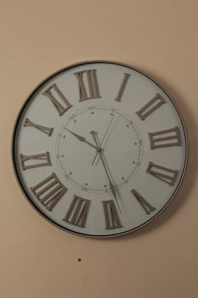 Oval Roman Numeral Wall Clock